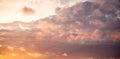 Dramatic sky with orange clouds over the city before dawn or sunset. Royalty Free Stock Photo