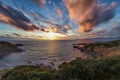 Dramatic sky over Alghero shore at sunset Royalty Free Stock Photo