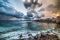 Dramatic sky over Alghero at sunset Royalty Free Stock Photo