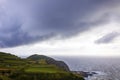 Dramatic sky over Atlantic Ocean coast near Sao Miguel Island, Azores, Portugal Royalty Free Stock Photo