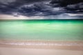 Dramatic sky over caribbean beach, Negril Seven Mile Beach, Jamaica Royalty Free Stock Photo