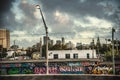 Dramatic sky over a colorful graffiti in Miami at sunset Royalty Free Stock Photo