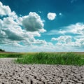 Dramatic sky over drought earth Royalty Free Stock Photo