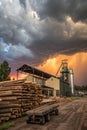 Dramatic sky over sawmill (lumber mill Royalty Free Stock Photo