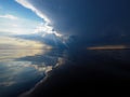 Dramatic Sky Over Water with Sun Rays and Storm Clouds Royalty Free Stock Photo