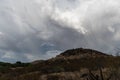 Dramatic sky and rainbow in Tucson, Arizona, near Mission San Xavier del Bac