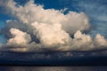 Dramatic sky with rainy clouds over the sea Royalty Free Stock Photo