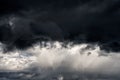 Dramatic sky with stormy clouds. The combination of light and dark clouds. Color trends