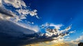 Dramatic Sky with Sunbeams Breaking Through Stormy Clouds Royalty Free Stock Photo