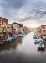 Dramatic sky and sunrise and boats in The Fishing Village of Al Maks in Alexandria Egypt