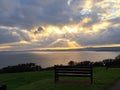 Dramatic sky at sunset across the sea in Devon UK
