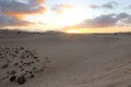 Dramatic sky sunset in desert, Corralejo Dunes in Furteventura, Canary Islands