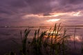 Dramatic sky at sunset on Mobile Bay, Alabama Royalty Free Stock Photo