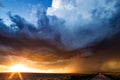 Dramatic sky with supercell thunderstorm at sunset