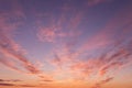 Dramatic soft sunrise, sunset. Beautiful pink violet orange clouds against blue sky background texture Royalty Free Stock Photo