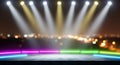 Neon Stage Spotlights Over City Bokeh Background Royalty Free Stock Photo