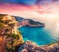 Dramatic spring scene on the Shipwreck Beach. Colorful sunset on the Ionian Sea, Zakinthos island, Greece, Europe. Beauty of