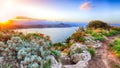 Dramatic spring sunset on the the cape Milazzo panorama of nature reserve Piscina di Venere