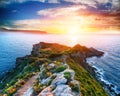 Dramatic spring sunset on the the cape Milazzo panorama of nature reserve Piscina di Venere Royalty Free Stock Photo