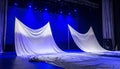 Pageant or Fashion Show Stage with White Fabric Decorations Royalty Free Stock Photo