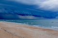 Dramatic storm cloud over a Florida beach