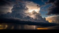 Dramatic storm clouds with lightning over a dark ocean at sunset dark sky Royalty Free Stock Photo