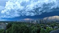 Dramatic storm clouds over city skyline Royalty Free Stock Photo