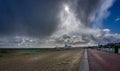 Dramatic storm clouds over Great Yarmouth Pier in Great Yarmouth, Norfolk, UK