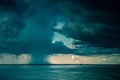 Dramatic storm clouds over the lake in Thailand, Tropical cyclone, Clouds rain and big storms with rain