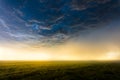 Dramatic storm clouds and sunset light Royalty Free Stock Photo