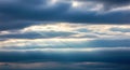 Dramatic Storm Sky with Dark Low-Hanging Clouds and Subtle Breaks of Light Royalty Free Stock Photo