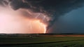 A dramatic storm at sunset producing a powerful tornado countryside with sheet lightning Royalty Free Stock Photo