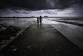 Dramatic stormy clouds at a beach Royalty Free Stock Photo