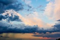 Stormy rain clouds at sunset