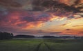 Dramatic Stormy Clouds over Green Fields at Summer Royalty Free Stock Photo