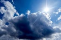 dramatic stormy cloudy sky with sun breaking through Royalty Free Stock Photo