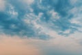 Dramatic stormy cumulus clouds at the sky in spring dusk Royalty Free Stock Photo