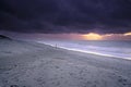 Dramatic stormy dark cloudy sky over sea, natural photo background Royalty Free Stock Photo