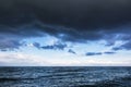 Dramatic stormy sky with dark clouds over the sea Royalty Free Stock Photo