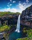 Dramatic summer morning on famous Svartifoss Black Fall Waterfall Royalty Free Stock Photo