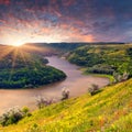 Dramatic summer sunrise near the river