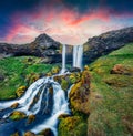 Dramatic summer sunrise on Sheep`s Waterfall. Splendid morning scene of Iceland, Europe. Beauty of nature concept background