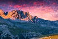 Dramatic summer sunset in Italy Alps, Tre Cime Di Lavaredo, Dolomites, Europe.