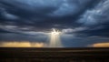 Dramatic Sun Rays Breaking Through Storm Clouds Over Vast Field Royalty Free Stock Photo
