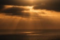 Dramatic sun rays over the Pacific Ocean at sunset from Torrey Pines State Reserve in San Diego, California Royalty Free Stock Photo