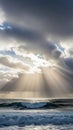 Dramatic Sun Rays Piercing Through Clouds Over Crashing Ocean Waves Royalty Free Stock Photo