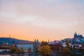 Dramatic sundown with a panoramic view of the other side of Prague in the autumn and a gradient of orange to pink colors in the Royalty Free Stock Photo