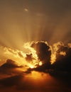 Dramatic sundown scene with dark clouds and rays