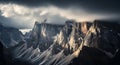 Dramatic Sunlight Breaking Through Clouds Over Rugged Mountain Peaks Royalty Free Stock Photo