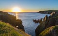 Dramatic sunrise cliffs at Cable John Cove Newfoundland. Daybreak over Atlantic ocean